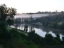 Low early morning mist over the lake in Vimoutiers